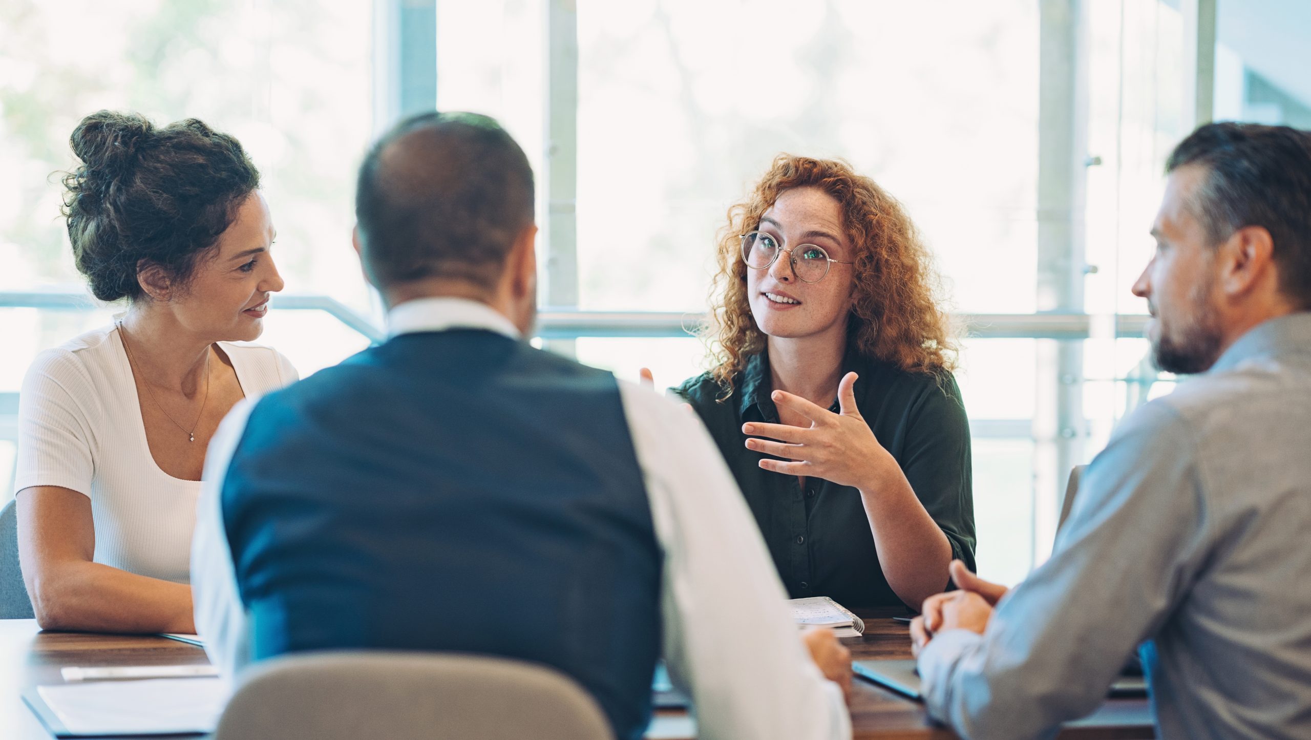 Young businesswoman talking on a meeting
